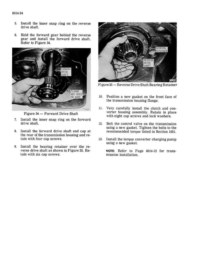 May include: An instructional page from a manual, featuring diagrams and text related to automotive repair. The images show hands working on mechanical components, with labels like "Forward Drive Shaft" and "Reverse Drive Shaft Bearing Retainer."