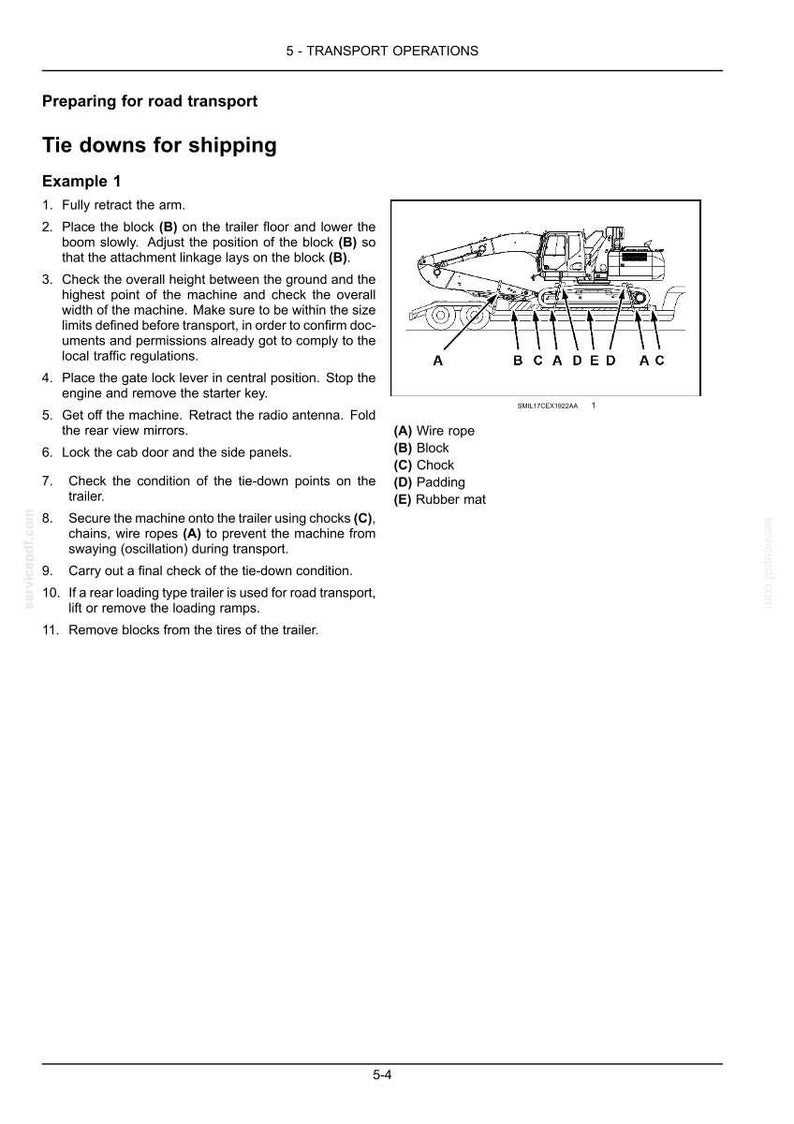 May include: Diagram illustrating the process of securing heavy machinery for road transport. The image shows a machine on a trailer, with labels indicating tie-down points, including wire ropes, blocks, and chocks. Instructions are provided.