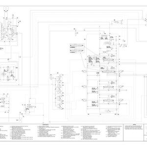May include: A detailed schematic diagram in black and white, featuring complex lines, symbols, and text. The diagram appears to be a technical illustration, likely for engineering or mechanical purposes. The layout is dense, with numerous interconnected components.