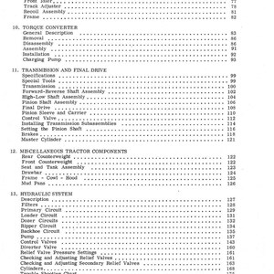 May include: A black and white printed page from a manual, detailing tractor system components. Sections include track system, torque converter, transmission, and hydraulic system, with page numbers.