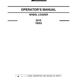 Op de afbeelding: Een witte handleiding met de tekst "CASE CONSTRUCTION" bovenaan. De titel "OPERATOR'S MANUAL" wordt weergegeven, gevolgd door "WHEEL LOADER", "921E" en "TIER3". Veiligheidsinstructies zijn ook opgenomen.