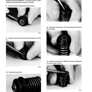 May include: Black and white instructional diagram with text detailing the removal of parts from a mechanical assembly. The steps include removing O-rings, compressing springs, and removing shims. The image is a technical illustration.
