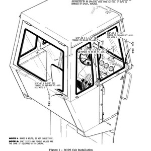 May include: Isometric diagram of a ROPS cab installation, with detailed views of bolt placements and torque specifications. The diagram includes text warnings and notes about bolt grades and torque values. The cab has multiple windows and a steering wheel.