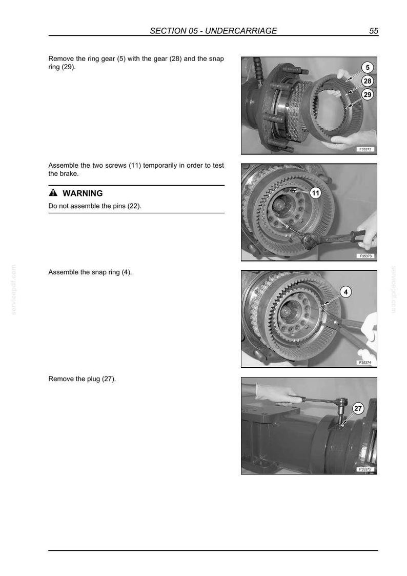 May include: A page from a manual showing the undercarriage section with instructions for removing and assembling parts. The images show gears, screws, and snap rings. Text includes warnings and part numbers.