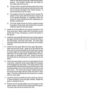 May include: A page from a manual detailing hydraulic systems, with numbered steps and diagrams. Instructions include installing seals, gaskets, and wear plates. The text is in black font on a white background.