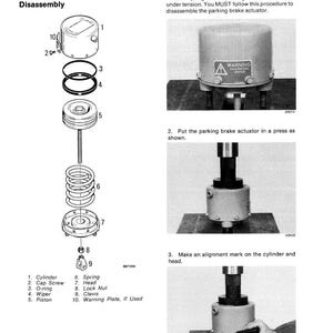 May include: Diagram of a parking brake actuator disassembly. The image includes exploded views of the components, labeled with numbers and names. Text includes warnings and instructions for the disassembly process. The image is in black and white.