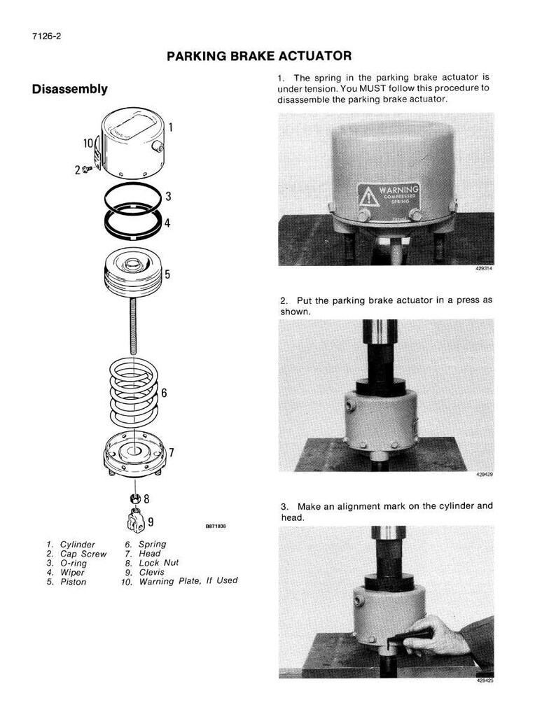 May include: Diagram of a parking brake actuator disassembly. The image includes exploded views of the components, labeled with numbers and names. Text includes warnings and instructions for the disassembly process. The image is in black and white.