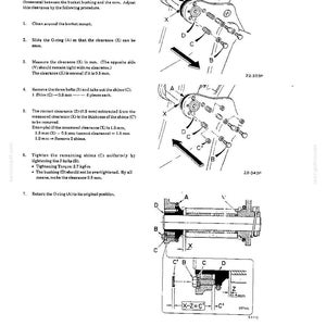 May include: A technical manual page titled SYSTEMS ATTACHMENTS showing an inspection and adjustment procedure for a bucket mount. It includes three black and white line drawings labeled 22-333P, 22-343P, and a detail view with labels A, B, C, D, X, V, and Z.
