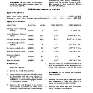 May include: A page from a manual detailing specifications and removal instructions for a steering control valve. Includes tables with part numbers, coil counts, free lengths in inches, and compression measurements in pounds.