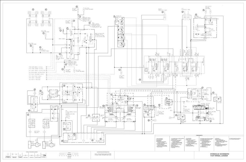 May include: Detailed engineering schematic of a hydraulic system for a 12F wheel loader. The diagram is in black and white, featuring numerous lines, symbols, and components. Text at the bottom reads "HYDRAULIC SCHEMATIC 12F WHEEL LOADER."