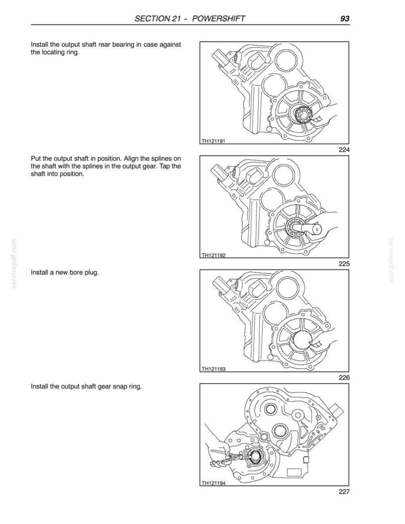 May include: A page from a manual with four sequential diagrams illustrating the installation of a powershift component. Each diagram shows a detailed view of the mechanical parts, with text instructions and part numbers.