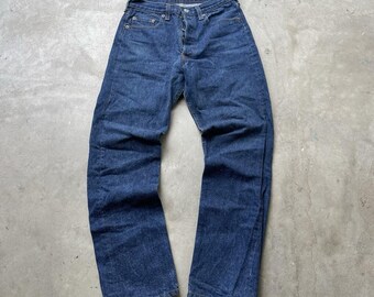 Jeans Levi's 501 vintage para hombre, talla 28x30, azul oscuro, cierre de botones, corte recto, fabricados en EE. UU. en los años 80.