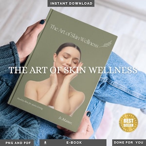 Könnte beinhalten: Eine Person hält ein Buch mit dem Titel "The Art of Skin Wellness". Das Cover ist olivgrün mit dem Titel in Weiß und einem Foto einer Frau. Der Text "Healthy Skin for Active Living" und "It Matter" sind ebenfalls sichtbar.