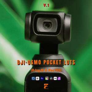 May include: A black DJI Osmo Pocket camera with the text "DJI-OSMO POCKET LUTS" and "(D-log-M & Rec709)". The camera has a lens and a screen with icons. The background is a blurred green.