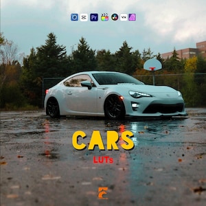 May include: A white sports car with black wheels is parked on a wet surface. The word "CARS" is in yellow block letters, and "LUTS" is in red. The image has a cinematic feel, with a blurred background of trees and a basketball hoop.