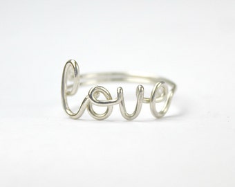 Whimsical Love Piercing Front 14K
