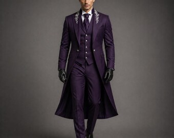 May include: A formal, three-piece purple suit with a long coat. The suit includes a waistcoat, trousers, and a long coat with silver embroidery on the lapels. The outfit is completed with a white shirt, a purple tie, black gloves, and black shoes.