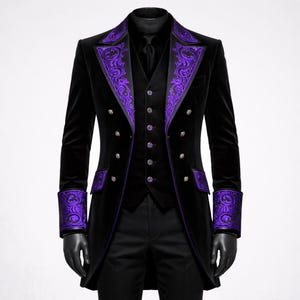 May include: Black velvet tailcoat with purple embroidered accents on the lapels, cuffs, and vest. The coat features silver buttons and a classic, formal design. A three-piece suit, perfect for special occasions.