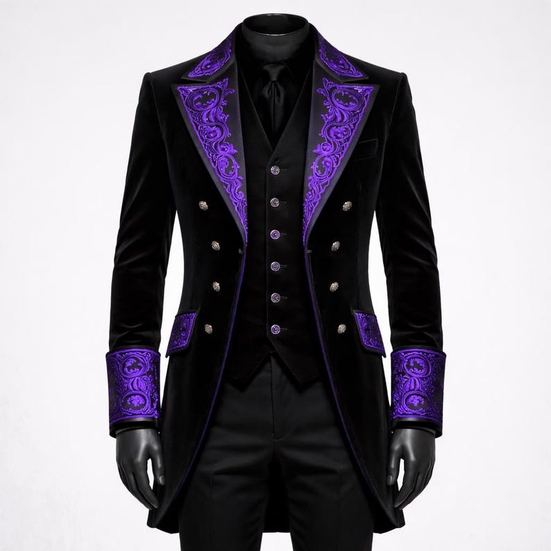 May include: Black velvet tailcoat with purple embroidered accents on the lapels, cuffs, and vest. The coat features silver buttons and a classic, formal design. A three-piece suit, perfect for special occasions.