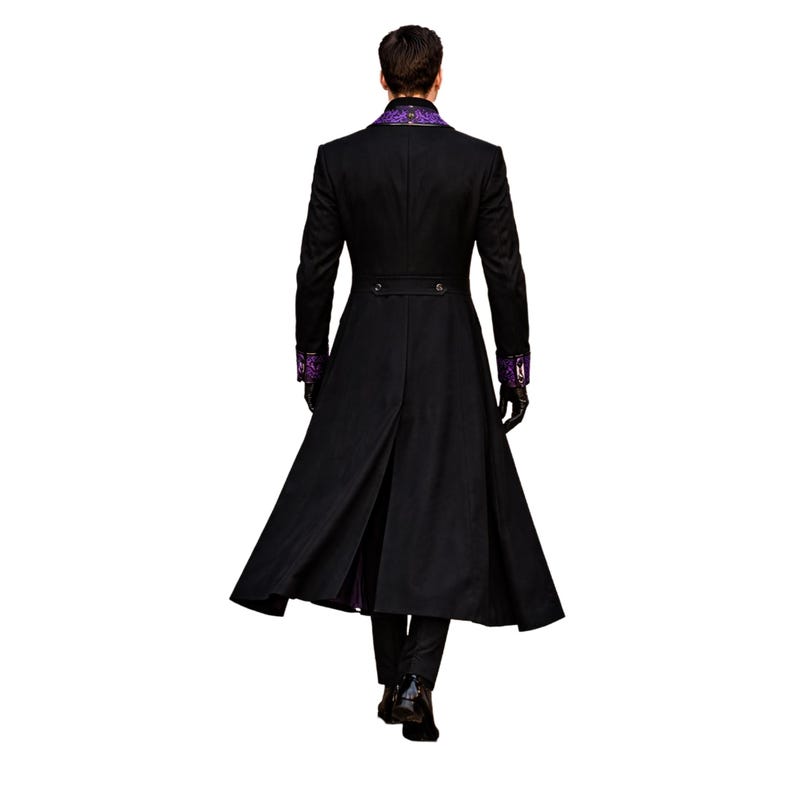 May include: A long black coat with purple embroidered accents on the collar and cuffs. The coat has a split back and a tailored fit. The person is wearing black gloves and black pants. The coat is a formal style.