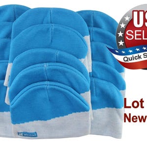 May include: A lot of 15 new caps in a bright blue and white color scheme. Each cap features a small rectangular blue tag with the white text Windows printed on the bottom edge. The caps are stacked in three columns, showing a consistent design.