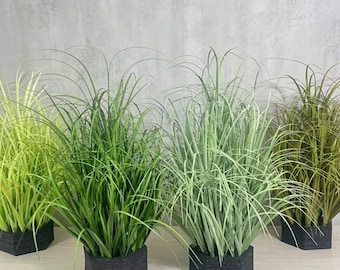 Arbustos de césped artificial: cañas realistas, césped cebolla para la decoración del jardín.