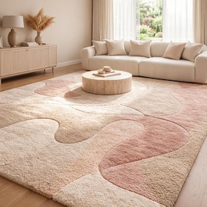 Hand tufted area rug
Organic Modern art
Beige pink rug
Pastel Home decor
Wavy Area Rug
Abstract shape rug
Dusty rose rug
Large Area Rug
Soft pink rug
Aesthetic bedroom
Minimalist Home
Vintage style rug
Neutral floor mat
