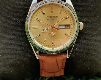 Unique vintage Citizen Automatic 21 Jewels Wristwatch golden case day /date
