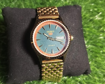 Vintage Seiko 5.  21 jwelles green dial day/date mede japan
