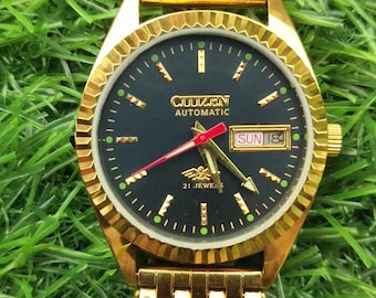 Reloj de pulsera Citizen vintage de 21 joyas con esfera negra, día/fecha, fabricado en Japón.