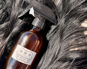 Elixir de crecimiento y spray desenredante Deeply Rooted Herbal Leave In 237 ml (8 oz)