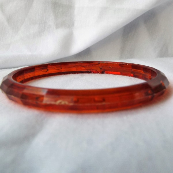 Thin Faceted Plastic Bangle Amber Color