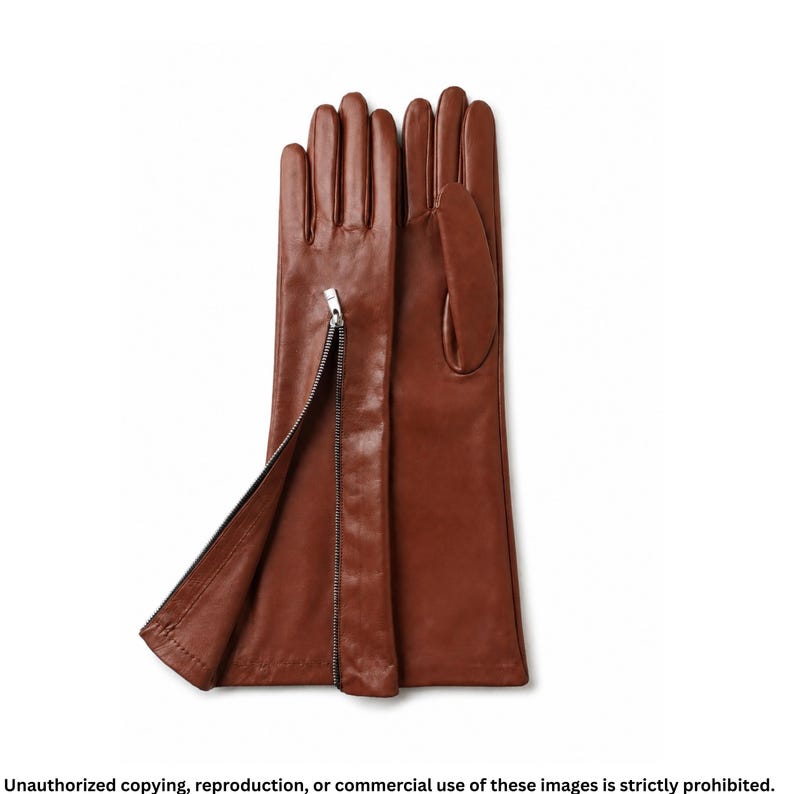 Handmade long brown leather gloves with side zipper crafted from soft genuine Nappa leather. Elegant women's driving gloves featuring a sleek full-finger design, premium craftsmanship, and a timeless luxury style perfect for autumn, winter, and formal fashion accessories.
