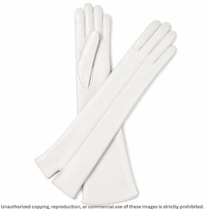 Pair of white long leather opera gloves for women featuring full fingers, a sleek center seam line, and small cuff slits.