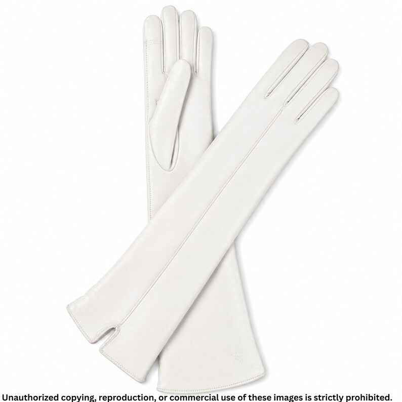 Pair of white long leather opera gloves for women featuring full fingers, a sleek center seam line, and small cuff slits.