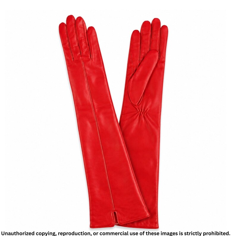 Long red leather opera gloves for women featuring an elegant center seam line, full fingers, and an above-the-elbow design.