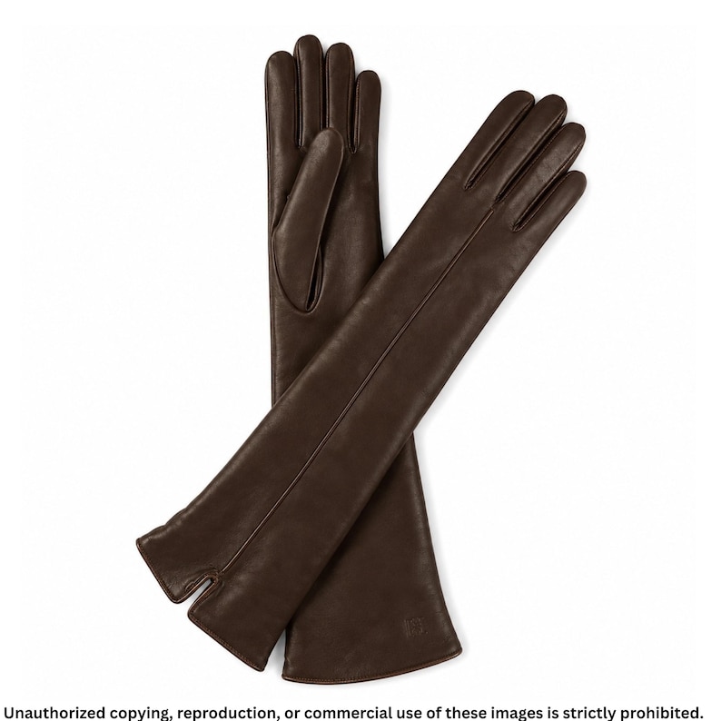 Pair of dark brown long leather opera gloves for women with full fingers, an elegant center seam line, and small cuff slits.
