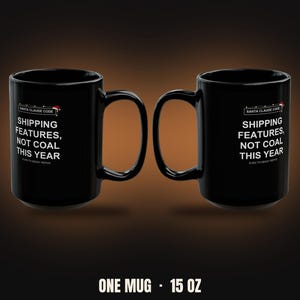 May include: Two black ceramic mugs, each with a capacity of 15 oz. The mugs feature the text "SANTA CLAUDE CODE" with a small Santa hat icon, followed by "SHIPPING FEATURES, NOT COAL THIS YEAR" and "EVEN TO MESSY REPOS" in white lettering.