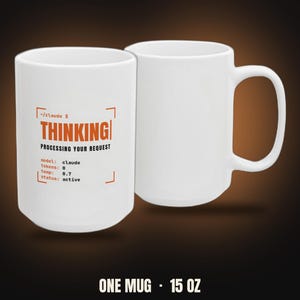 May include: A white ceramic mug with a 15 oz capacity featuring orange and black text that reads: ~/claude $ THINKING PROCESSING YOUR REQUEST model: claude tokens: 0 temp: 0.7 status: active, framed by orange corner brackets on the front surface.