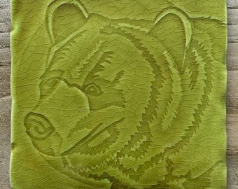 Handmade tile,  Bear design in olive  colour glaze, made in UK
