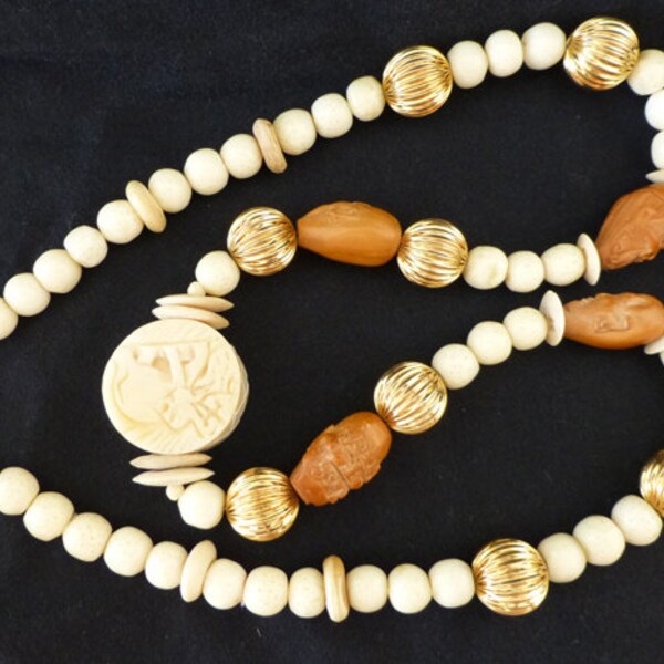 Eclectic 1970's vintage necklace, faux ivory carvings, large, chunky necklace