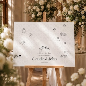 Op de afbeelding: Een wit rechthoekig welkomstbord voor een bruiloft op een houten ezel met een raster van lege cirkels, een centrale illustratie van een koppel en de tekst "WELCOME TO OUR WEDDING", "Claudia & John" en "10 AUGUST 2026" met enkele ingevulde gezichten.