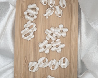 Borlas a rayas beige y blancas