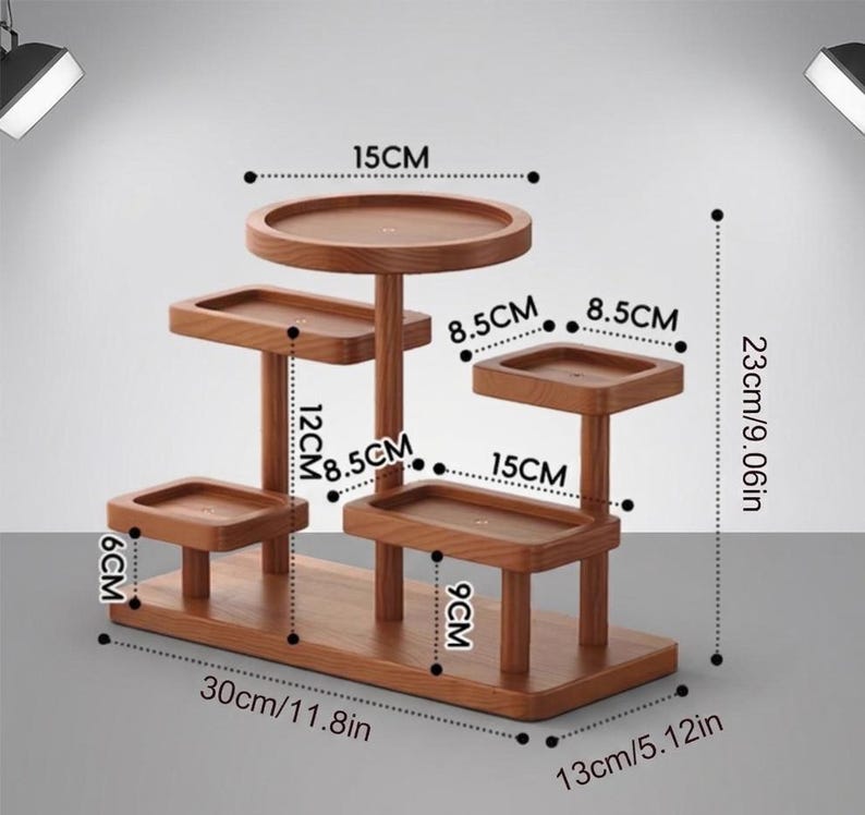 May include: A multi-tiered wooden plant stand with various levels for displaying plants or decor. The stand is 11.8 inches long, 5.12 inches wide, and 9.06 inches tall. Each tier is a different size and shape.