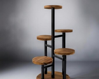 May include: A multi-tiered plant stand with a round base and multiple circular shelves. The shelves and base are made of wood, and the supporting structure is black metal. The stand has a modern design and is suitable for displaying plants.