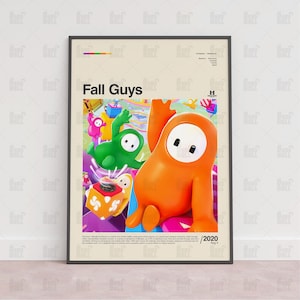 May include: A framed poster featuring the game "Fall Guys." The poster has an orange character in the foreground with a green character behind it. The poster has the game title and the year 2020.
