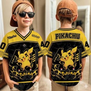 May include: A yellow and black jersey featuring a graphic of the character Pikachu, the text Pikachu and Pokémon, and the number 40. The design includes lightning bolt patterns and a V-neck collar, presented in a front and back view of the garment.