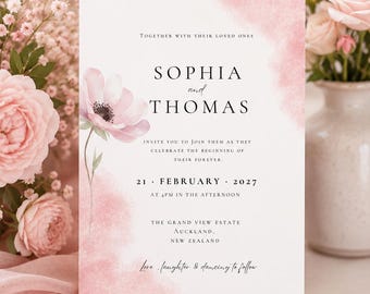 May include: A rectangular wedding invitation card featuring a white background with soft pink watercolor accents and a single illustrated pink flower. The text reads: Together with their loved ones, Sophia and Thomas, invite you to join them as they celebrate the beginning of their forever, 21 February 2027, at 4pm in the afternoon, The Grand View Estate, Auckland, New Zealand, Love, laughter & dancing to follow.