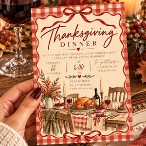 May include: A rectangular Thanksgiving dinner invitation card featuring a red and white gingham border with a red ribbon bow at the top and bottom. The text reads Thanksgiving Dinner, Join us for very thankful little dinner party, Saturday 22 November at 6:00 PM, The Smith Residence 123 Maple Road Wellington, and Please RSVP by 15 November to Rose on 021 123 4567.