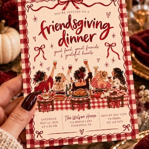 May include: A rectangular Friendsgiving dinner invitation card with a red and white gingham border. The text reads: You're invited to a friendsgiving dinner, good food, great friends & grateful hearts. It features an illustration of five people toasting at a table, with event details for Saturday Nov 22, 2026 at 6:00 PM at The Wilson Home, 123 Maple Lane, Tauranga, NZ, and RSVP by Nov 15th to Emma at 021 234 5678.